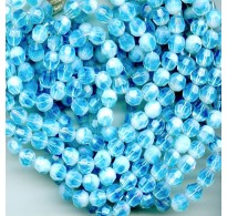 VINTAGE OPALESCENT FACETED AQUA BEADS