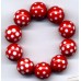 VINTAGE RED LUCITE WITH FACETED DOTS