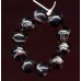 VINTAGE BLACK BEADS WITH SILVER FOIL SWIRLS