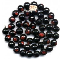 VINTAGE JAPANESE SHINEY BLACK AND RUST EYE BEADS