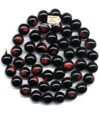 VINTAGE JAPANESE SHINEY BLACK AND RUST EYE BEADS